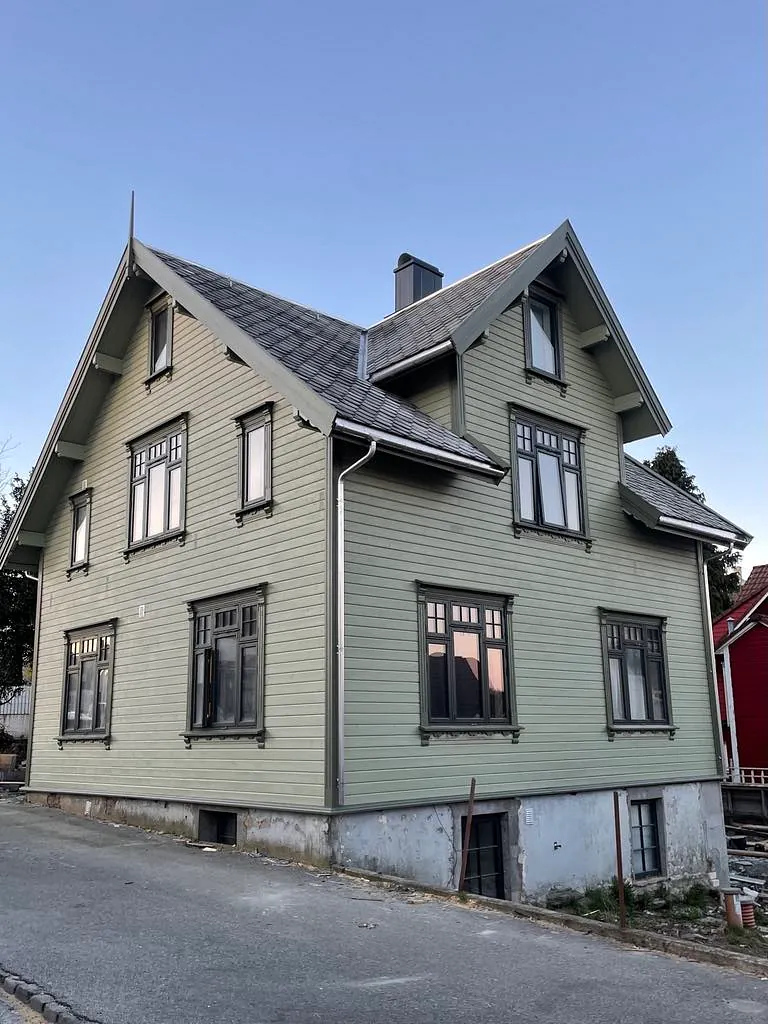 Renovert grønt hus